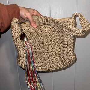 The Sak Tan Crochet Shoulder Bag with Colorful Tassel